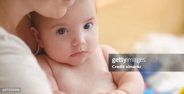 baby boy with mother - hazel bond stock pictures, royalty-free photos & images