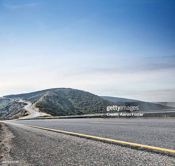 hight mountain road - crash barrier stock pictures, royalty-free photos & images