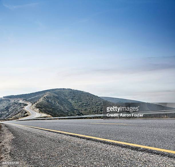 hight mountain road - vägräcke bildbanksfoton och bilder