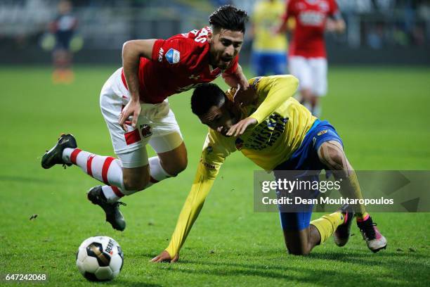 Marvin Peersman of SC Cambuur battles for the ball with Alireza Jahanbakhsh of AZ Alkmaar during the Dutch KNVB Cup Semi-final match between AZ...