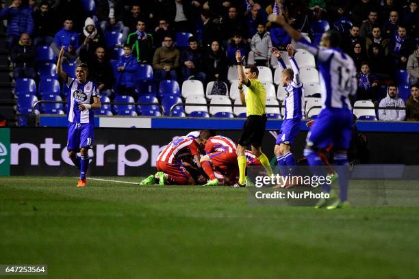 Fernando Torres forward of Atletico de Madrid falls unconscious on the ground after a blow with Alex Bergantiños of Deportivo de La Coruña during the...