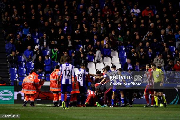Fernando Torres forward of Atletico de Madrid falls unconscious on the ground after a blow with Alex Bergantiños of Deportivo de La Coruña during the...
