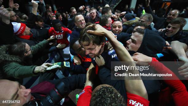 Goalkeeper, Tim Krul of AZ Alkmaar celebratres with team mates after saving the final penalty in the shoot out to win the Dutch KNVB Cup Semi-final...