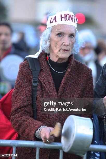 Protestors demonstrate against Les Republicans political party candidate for the 2017 presidential election Francois Fillon candidate during a...