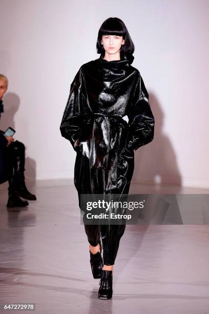 Model walks the runway during the Wanda Nylondesigned by Nana Aganovich show as part of the Paris Fashion Week Womenswear Fall/Winter 2017/2018 on...