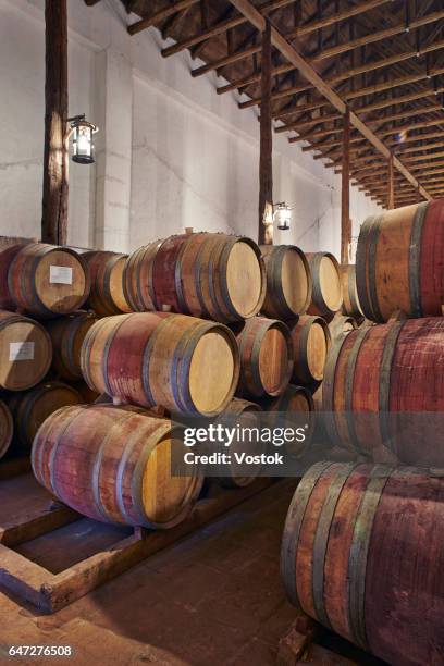 wine cellar at chilean winery - weinfass stock-fotos und bilder