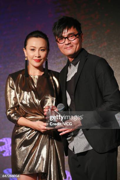 Actress Carina Lau and actor Lam Ka Tung pose during Hong Kong Film Directors' Guild Award Ceremony on March 2, 2017 in Hong Kong, China.