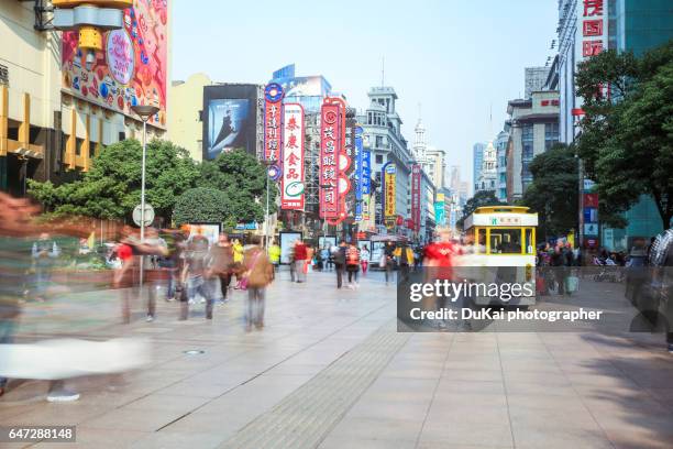 china, shanghai, pedestrians on nanjing road, - people shanghai stockfoto's en -beelden