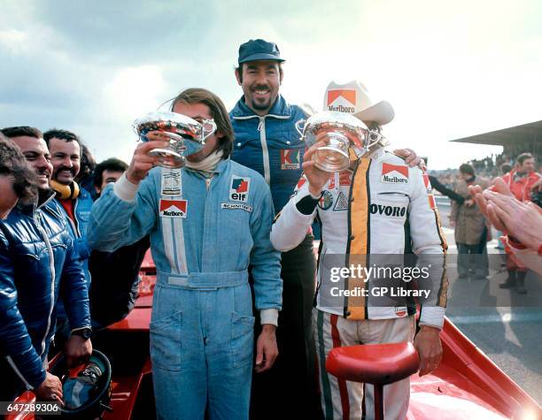 Jacques Laffite, Willi Kauhsen and Arturo Merzario are winners at the Dijon 1000kms, 1975.