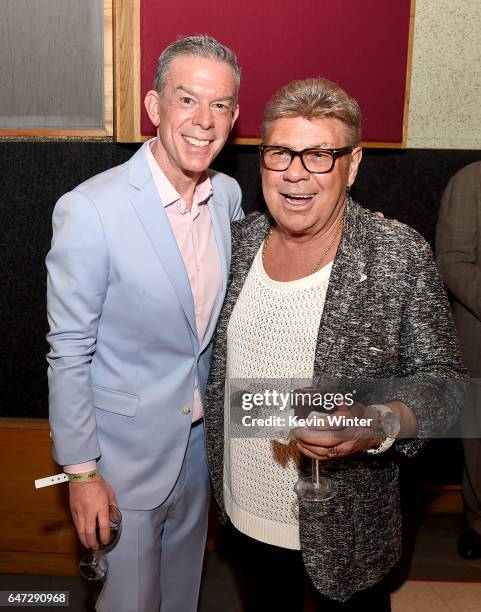 Elvis Duran and singer Uncle Johnny pose at a reception celebrating radio personality Elvis Duran's star on the Hollywood Walk of Fame at Capitol...