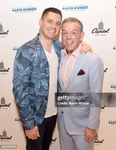 Elvis Duran and his partner Alex Carr pose at a reception celebrating radio personality Elvis Duran's star on the Hollywood Walk of Fame at Capitol...