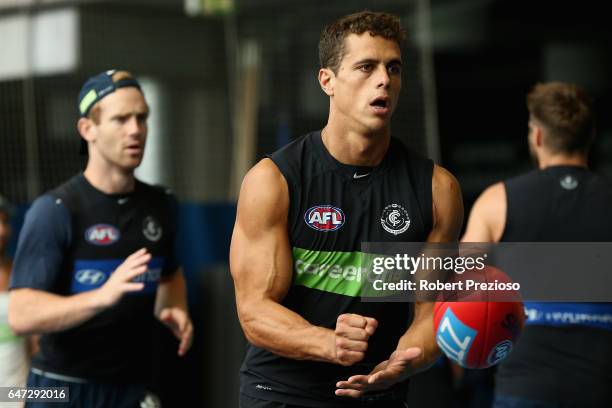 Ed Curnow handballs during a Carlton Blues AFL media opportunity at Ikon Park on March 3, 2017 in Melbourne, Australia.