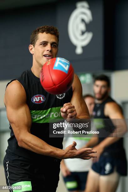 Ed Curnow handballs during a Carlton Blues AFL media opportunity at Ikon Park on March 3, 2017 in Melbourne, Australia.