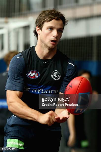 Dylan Buckley handballs during a Carlton Blues AFL media opportunity at Ikon Park on March 3, 2017 in Melbourne, Australia.