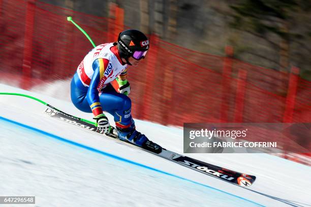 Stacey Cock of the US competes during the second women's downhill practice at a FIS Alpine Ski World Cup in Jeongseon, some 150km east of Seoul, that...