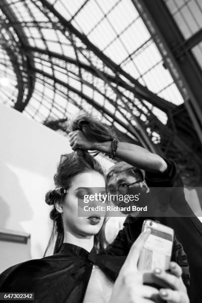 Model prepares backstage before the Pascal Millet show at the Grand Palais as part of the Paris Fashion Week Womenswear Fall/Winter 2017/2018 on...