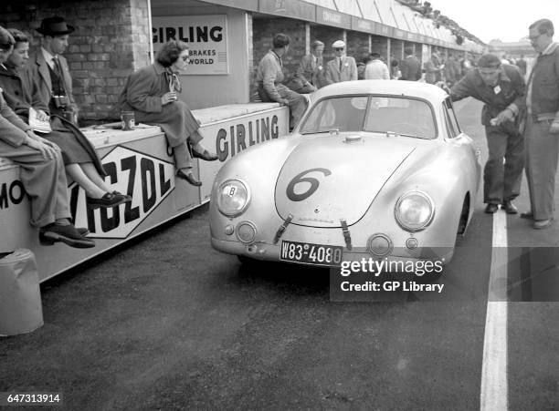 Porsche 356 coupe in the pits at Silverstone, 1953.