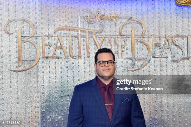 Josh Gad arrives at the world premiere of Disney's new live-action "Beauty and the Beast" photographed in front of the Swarovski crystal wall at the...