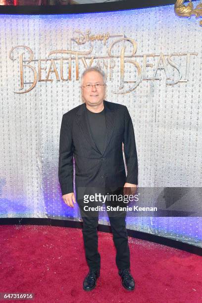Alan Menken arrives at the world premiere of Disney's new live-action "Beauty and the Beast" photographed in front of the Swarovski crystal wall at...