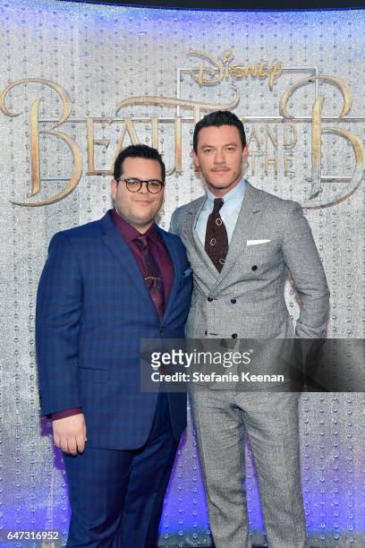 Josh Gad and Luke Evans arrive at the world premiere of Disney's new live-action "Beauty and the Beast" photographed in front of the Swarovski...