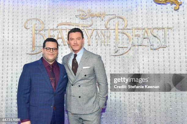 Josh Gad and Luke Evans arrive at the world premiere of Disney's new live-action "Beauty and the Beast" photographed in front of the Swarovski...