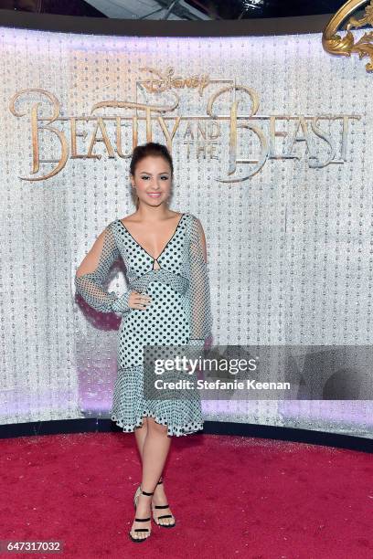 Amy Correa arrives at the world premiere of Disney's new live-action "Beauty and the Beast" photographed in front of the Swarovski crystal wall at...