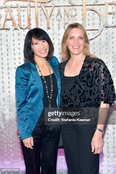 Lauren Tom and Karen Ahmanson arrive at the world premiere of Disney's new live-action "Beauty and the Beast" photographed in front of the Swarovski...