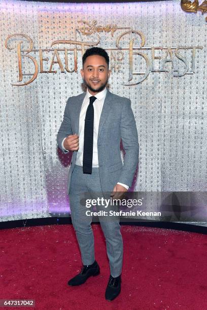 Tahj Mowry arrives at the world premiere of Disney's new live-action "Beauty and the Beast" photographed in front of the Swarovski crystal wall at...