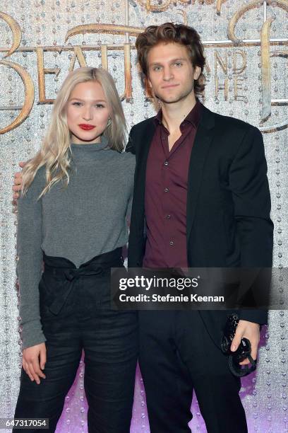 Keegan Allen arrives at the world premiere of Disney's new live-action "Beauty and the Beast" photographed in front of the Swarovski crystal wall at...