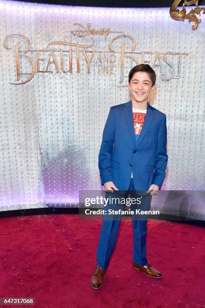 Asher Angel arrives at the world premiere of Disney's new live-action "Beauty and the Beast" photographed in front of the Swarovski crystal wall at...