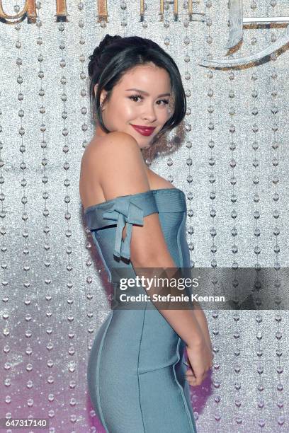 Cierra Ramirez arrives at the world premiere of Disney's new live-action "Beauty and the Beast" photographed in front of the Swarovski crystal wall...