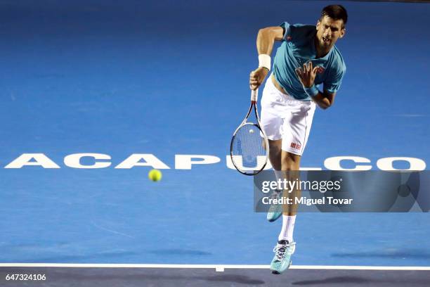 Novak Djokovic of Serbia serves during the match between Novak Djokovic of Serbia and Nick Kyrgios of Australia as part of the Abierto Mexicano...