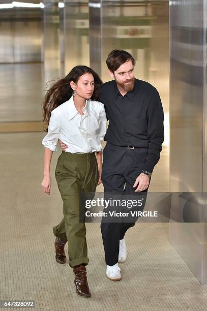 Fashion designers Christophe Lemaire and Sarah-Linh Tran walk the runway during the Lemaire Ready to Wear fashion show as part of the Paris Fashion...