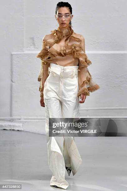 Model walks the runway during the Anne Sofie Madsen Ready to Wear fashion show as part of the Paris Fashion Week Womenswear Fall/Winter 2017/2018 on...