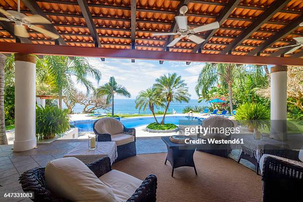 mexico, punta de mita, veranda with with view to the swimming pool and the sea - nayarit stockfoto's en -beelden