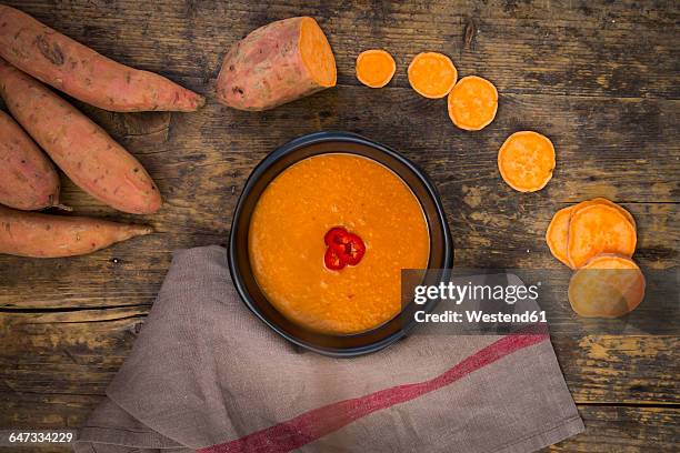 bowl of sweet potato coconut soup - mashed sweet potato stock-fotos und bilder