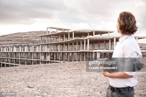 spain, fuerteventura, jandia, architect looking at building shell - architect in landscape stock pictures, royalty-free photos & images