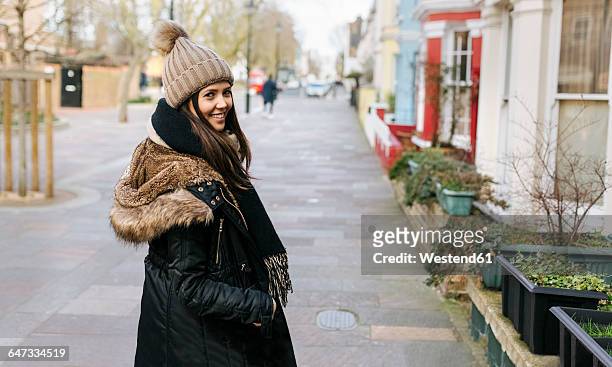 uk, london, notting hill, portrait of smiling young woman - the 2016 notting hill carnival stock pictures, royalty-free photos & images