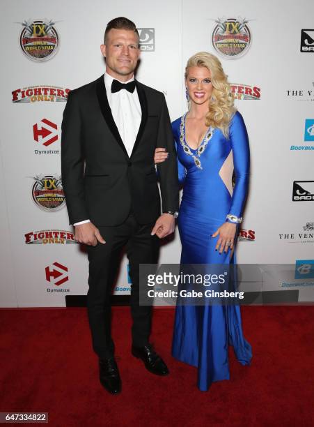 Television personality and former mixed martial artist Bristol Marunde and his wife, television personality Aubrey Marunde, attend the ninth annual...