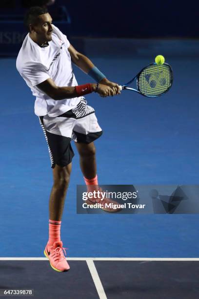 Nick Kyrgios of Australia returns the ball during the match between Novak Djokovic of Serbia and Nick Kyrgios of Australia as part of the Abierto...