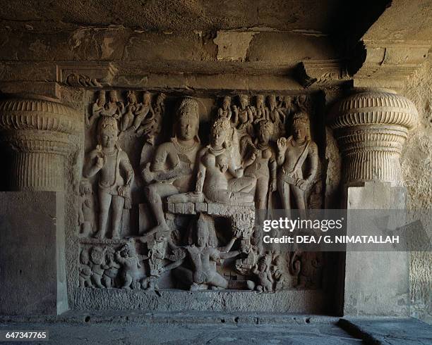 Shiva and Parvati seated on mount Kailash, while Ravana tries to lift it, relief from Dhumar Lena , Ellora Caves , Maharashtra. India, 6th-8th...