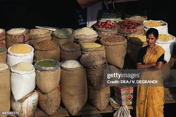 Woman selling spices at Connemara Market, Trivandrum, Kerala, India.