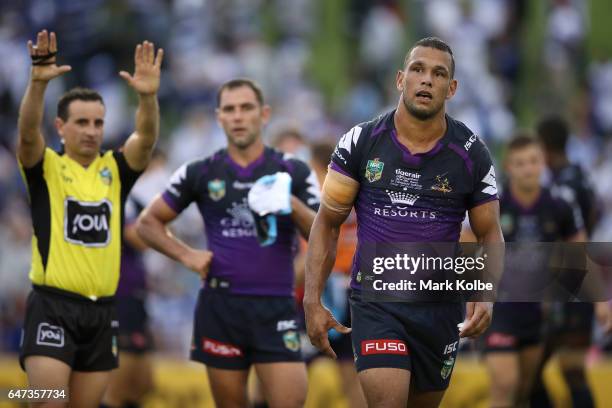 Will Chambers of the Storm looks dejected as he is given ten minutes in the sin bin for fighting during the round one NRL match between the...