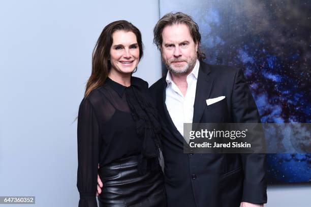 Brooke Shields and Chris Henchy attend Damian Loeb Sgr A* at Acquavella Galleries on March 2, 2017 in New York City.