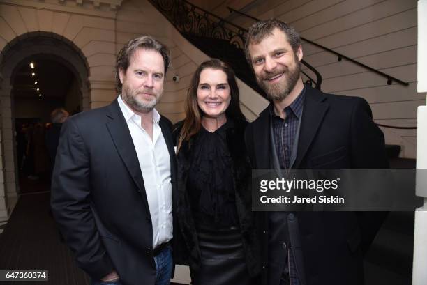 Chris Henchy, Brooke Shields and Matt Stone attend Damian Loeb Sgr A* at Acquavella Galleries on March 2, 2017 in New York City.