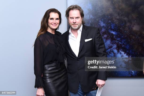 Brooke Shields and Chris Henchy attend Damian Loeb Sgr A* at Acquavella Galleries on March 2, 2017 in New York City.