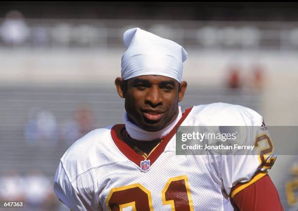 Deion Sanders of the Washington Redskins looks on the field during the game against the Arizona Cardinals at the Sun Devil Stadium in Tempe, Arizona....