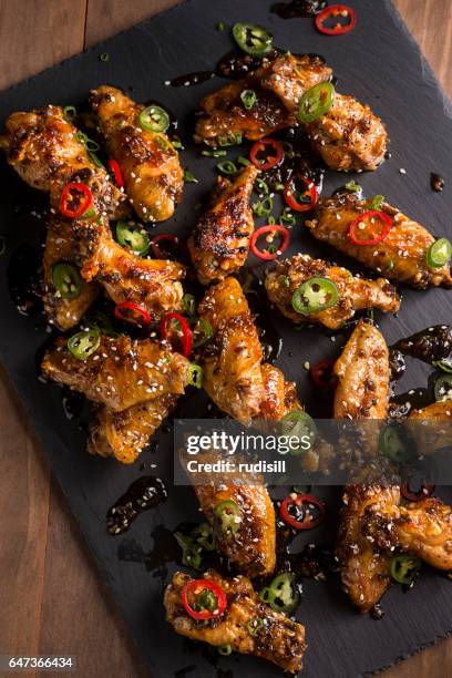 honey serrano chicken wings - chicken wing stock pictures, royalty-free photos & images