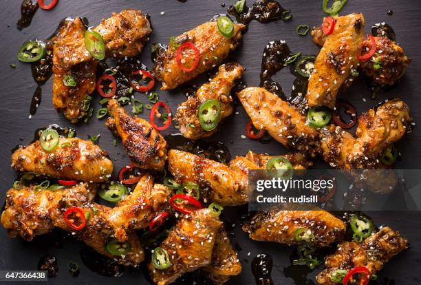honey serrano chicken wings - chicken wing stock pictures, royalty-free photos & images