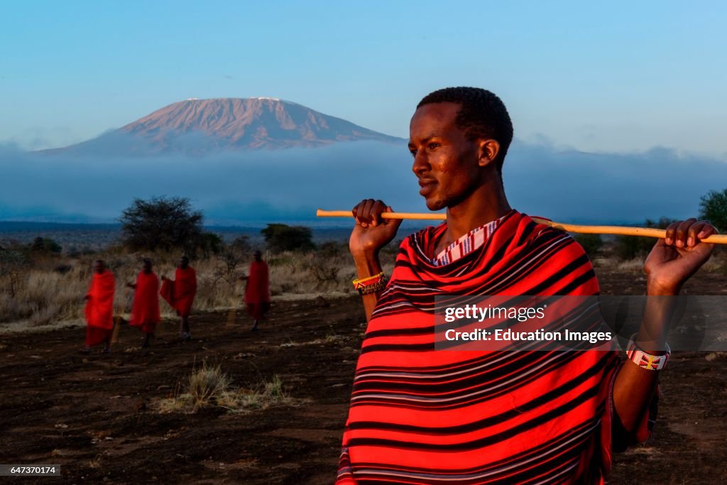 Maasai, Masai, elders with Mt Kilimanjaro in the background, Kenya.